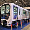 「鉄道技術展」の三菱重工ブースに展示された「ゆりかもめ」の新型車両7300系