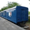 能登中島駅で保存されている郵便車（オユ10 2565）。『のと里山里海号』ではオユ10の見学なども楽しめるようにする。
