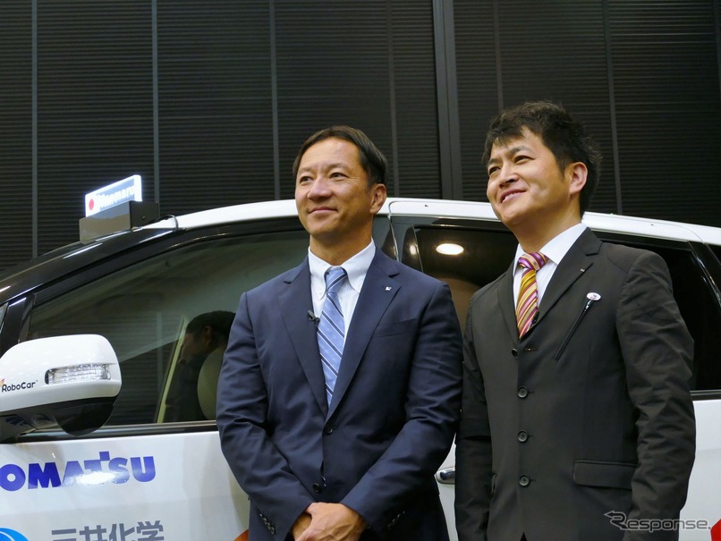 向かって左から、日の丸交通の富田和孝社長、ZMPの谷口恒社長
